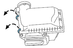 1. Release the clamps that secure the air filter housing cover.